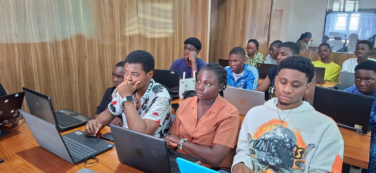 Students learning at Early Code Institute